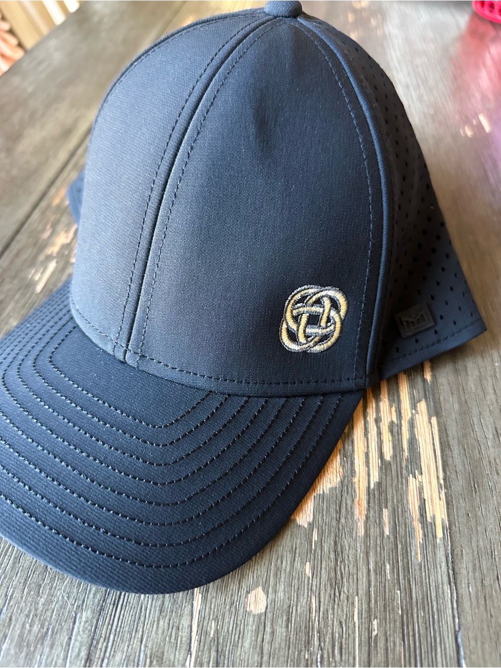 Melin A-Game Hydro Hat Black Snapback Embroidered Logo Performance Cap